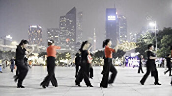 Chinese perform square dance in Guangzhou as mass COVID testing continues