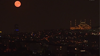 Full moon rises over Istanbul's Grand Çamlıca Mosque