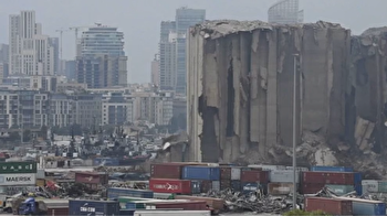Two years after Beirut explosion, smoke rises over huge grain silos