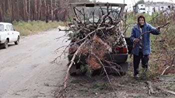 Residents of Ukraine's Izium gather firewood amid fuel shortages