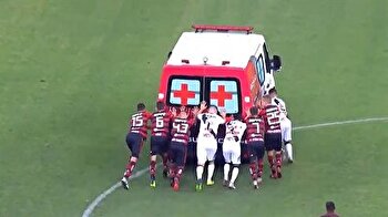 Brazilian soccer players push-start ambulance off field