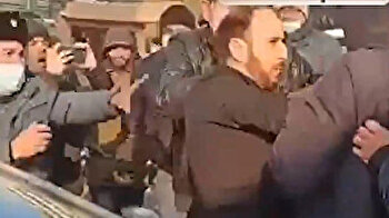 Pro-Pashinyan lawmaker attacks protestors in front of Armenian parliament building