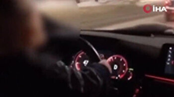 Irresponsible Russian dad lets his 2-year-old son drive car