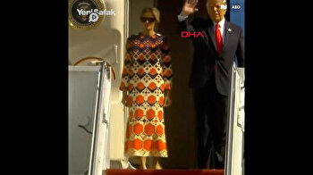 Melania Trump dons bold $4,000 orange dress as she arrives in Florida