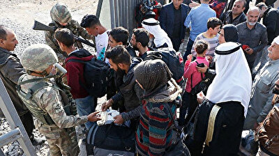 سوريون عائدون للمناطق الآمنة: سعادة واستقرار في بلادنا