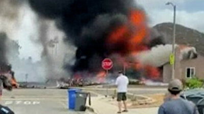 At least 2 dead after plane crashes into homes in California