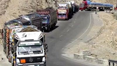 Afghan truckers wait in long queues at border gate with Pakistan