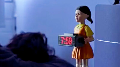 Outrageous Squid Game alarm clock wakes you up with darts!