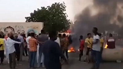 Sudanese take to streets after PM put under house arrest, top officials detained
