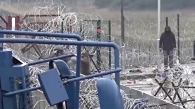 Poland fortifies border with Belarus using barbed wire amid migrant crisis