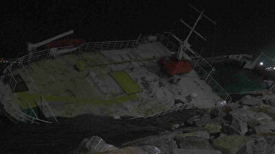 Powerful winds knock over giant cargo ship as storm pounds Istanbul
