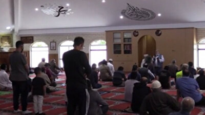 Muslim worshippers back in mosque for Friday prayers as Melbourne lifts Covid restrictions