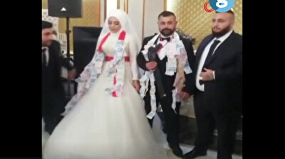 Man gifts newlywed groom 'rifle' in Turkey's Istanbul
