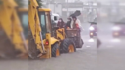 Digger trucks rescue stranded locals as flash floods inundate Turkey's Antalya