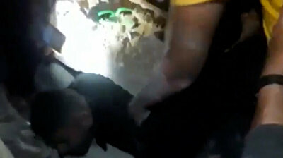 Gazan youth pulled out from under rubble after deadly Israeli air strike