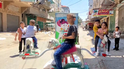 Gazan kids celebrate Eid al-Fitr under shadow of Israeli attacks