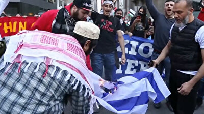 Pro-Palestine protesters burn Israeli flag in New York