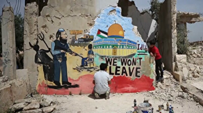 Syrian artist expresses solidarity with Palestinians in Al-Aqsa Mosque graffiti
