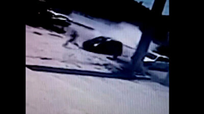 Car swerves to avoid incoming truck, nearly hits pedestrian in Turkey