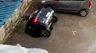 Shocking footage: massive sinkhole swallows up car in India's Mumbai after heavy rain