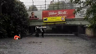Passengers swim out of submerged vehicle following heavy rainfall in Istanbul