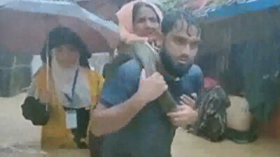 Rohingya Muslims submerged in water after raging monsoons hit camp