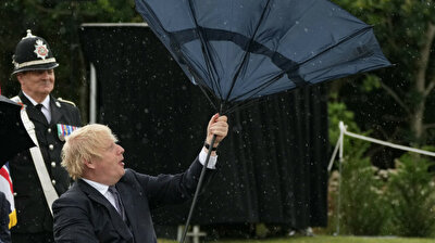Prince Charles laughs his head off at Boris Johnson's umbrella malfunction