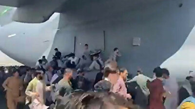 Afghans clinging onto US Air Force plane fall to their death during take-off