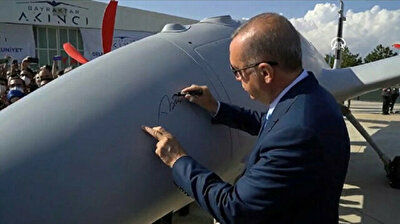 President Erdoğan signs Turkey's cutting-edge Akinci drone