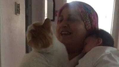 Good vibes only: Turkish woman treats cat as if it were her own grandchild