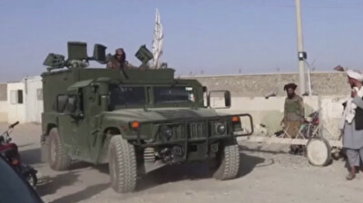 Taliban hold 'military parade' to celebrate victory after US pullout