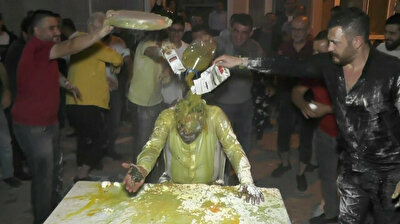 Eggs, oil and vinegar: Turkish groom turns into pancake in bizarre wedding ritual