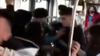 Fists talk and kicks fly as angry students turn bus into war zone in Turkey