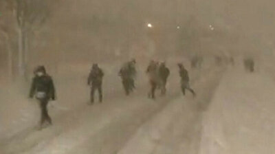 Citizens forced to walk home after traffic deadlock in snow-battered Istanbul