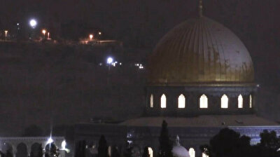 Palestinians delight as snow dusts Dome of the Rock in Jerusalem