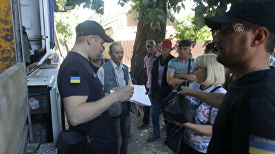 Civilians receive aid in Ukraine’s devastated Bakhmut