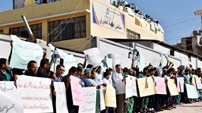 Health workers protest Assad regime attacks in Idlib