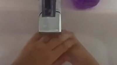 Adorable Turkish girl demonstrates the proper way to wash hands