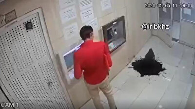 Oil suddenly starts gushing out of the ground at ATM in Iran