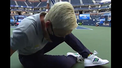 Famous athlete hits official in the throat with tennis ball