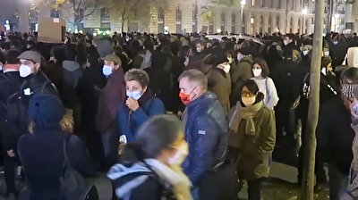 Let them sleep! Parisians stand up for asylum seekers against police violence
