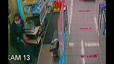 Female cashier wards off thief by busting pickle jar over his head