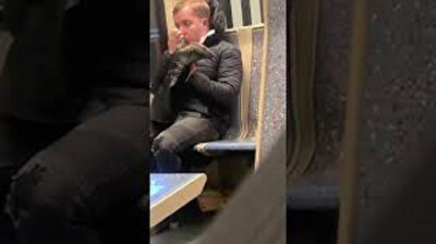 Creepy man licks dirty boot clean on train