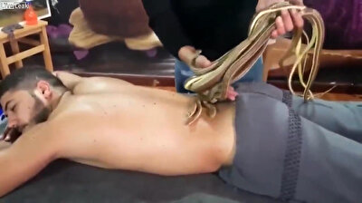 Freaky snake massage in Egypt will make your skin crawl