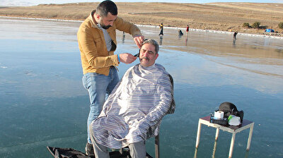 Turkish man gets haircut over frozen Çıldır Lake
