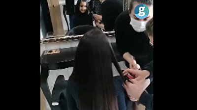Seven-year-old girl donates hair to make wigs for children with cancer