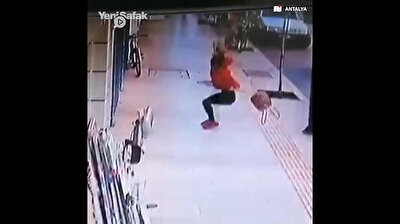 Woman falls from balcony in tragic video
