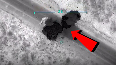 Video shows PKK terrorists' paramotor being hit by Turkish drone