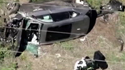 Shocking aftermath of Tiger Woods car crash caught on tape