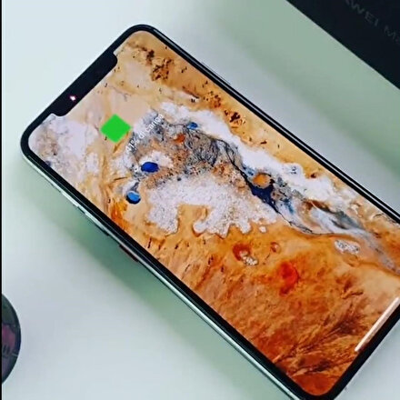 Huawei Mate 20 Pronun kablosuz şarjı iPhone XSi şarj ediyor